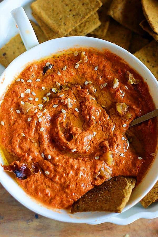 Two homemade dips in small bowls