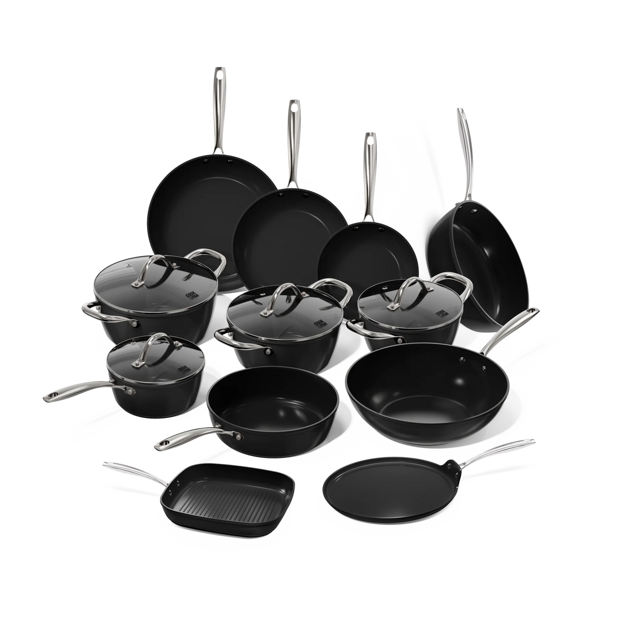 Zwarte Signature pannenset 12-delig: koekenpannen, kookpotten met glazen deksels, wokpan, hapjespannen, grillpan en pannenkoekenpan.