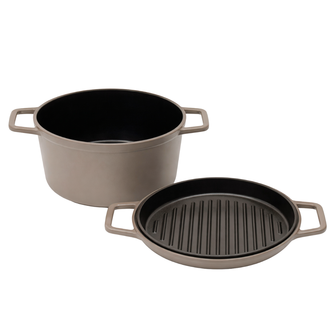 Taupe-colored dutch oven with double handles and a lid that also serves as a grill plate.