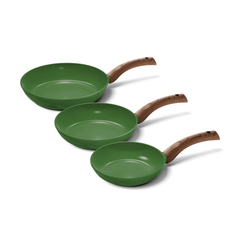 Set of three green frying pans with wooden handles in different sizes.