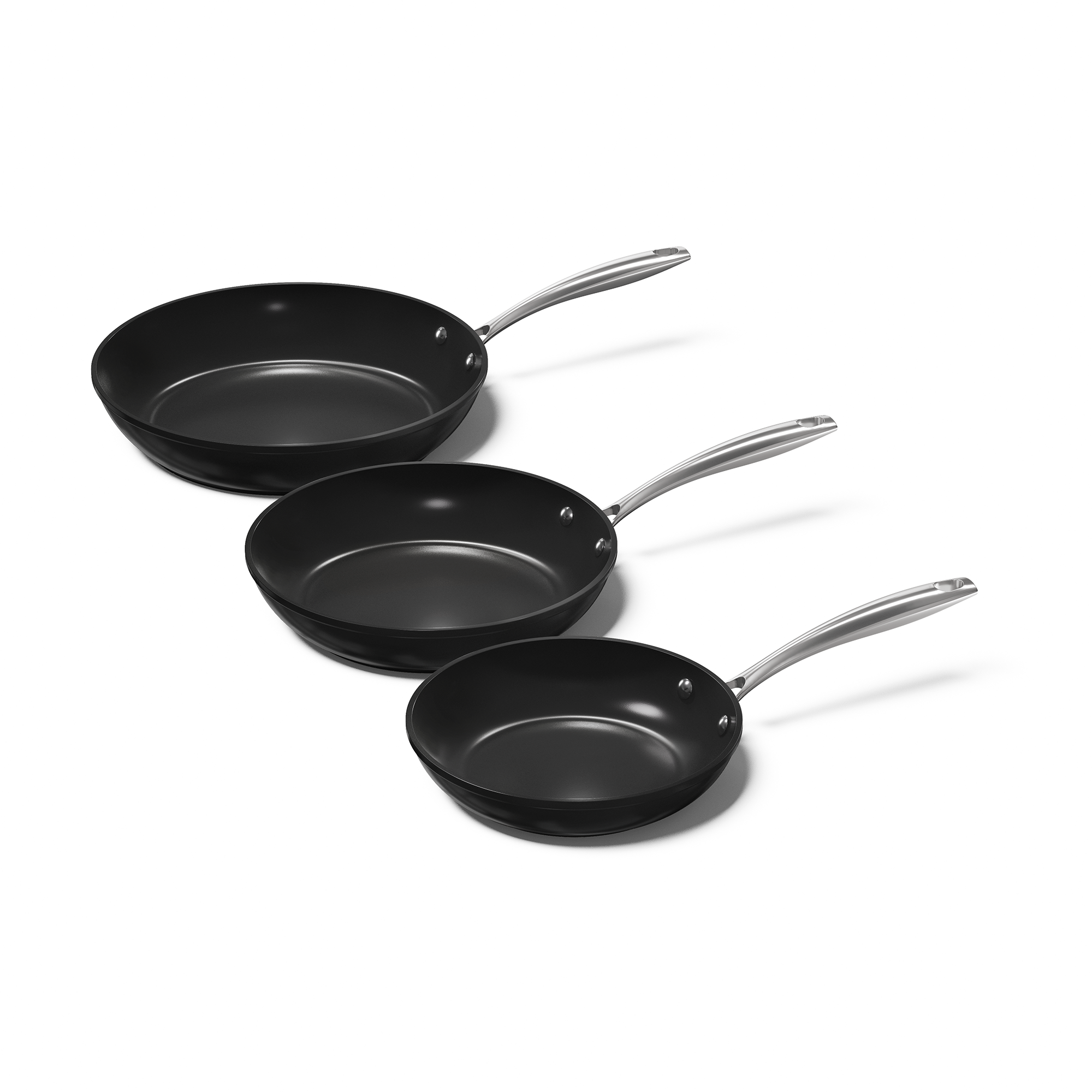 Set of three black frying pans with silver handles in different sizes.