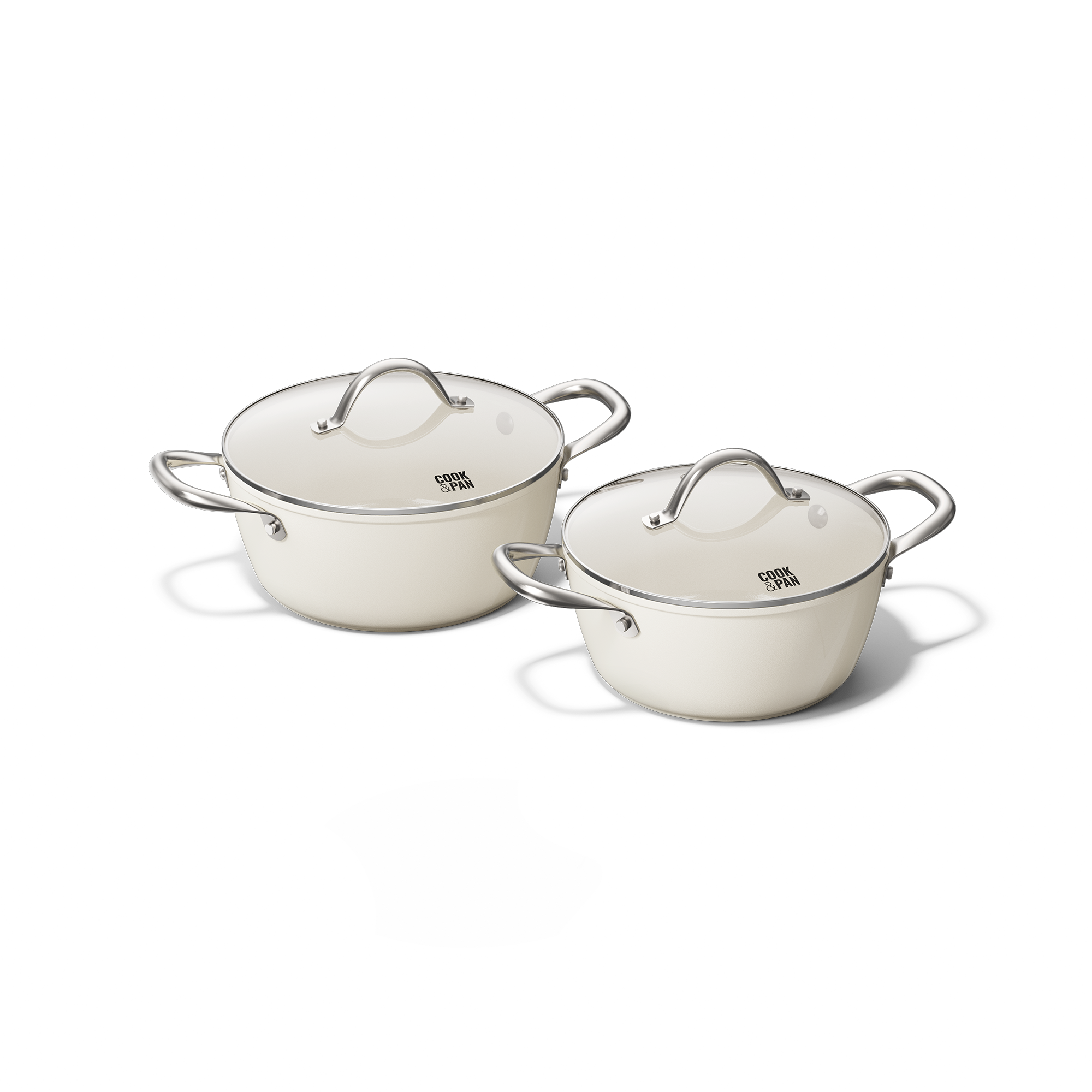2-delt elfenbensfarvet pandesæt med rustfri ståldæksler og håndtag.