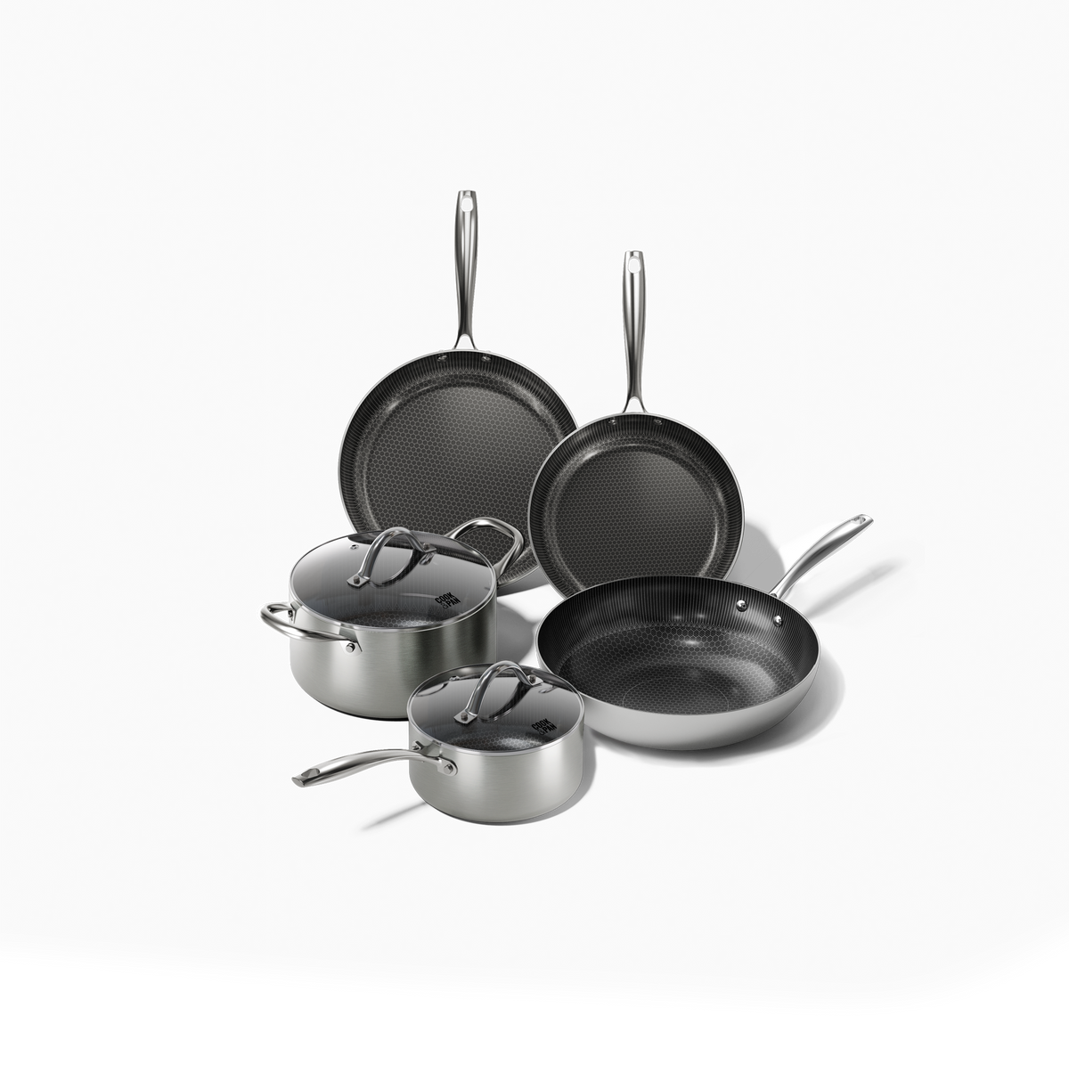 Honey pannenset met twee koekenpannen, twee kookpotten met deksel en metalen handvaten.