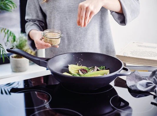 Wat is een wokpan? Ontdek de voordelen!