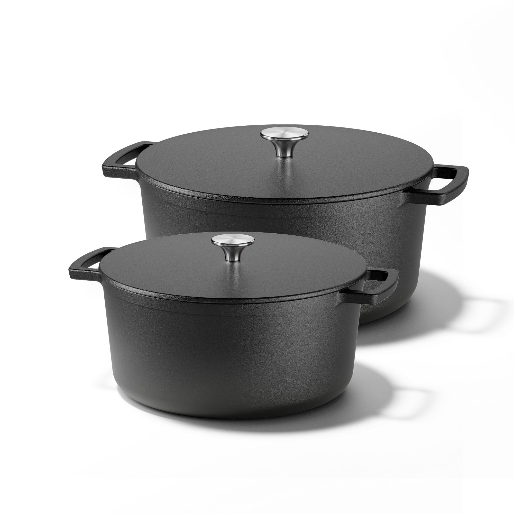 Signature cast iron Dutch oven set with two black cooking pots and lids featuring stainless steel knobs
