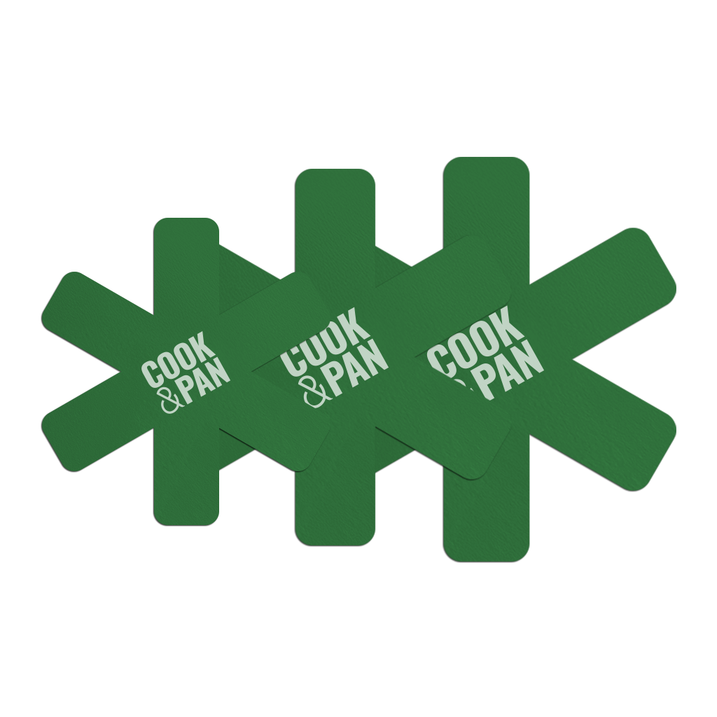 Set of three green pan protectors with a cross-shaped design and white logo print.