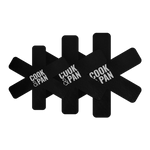 Protège-poêles en silicone noir avec texte blanc, lot de trois, design en forme de croix.