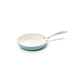 Blue frying pan 20 cm with white ceramic interior and metal handle.