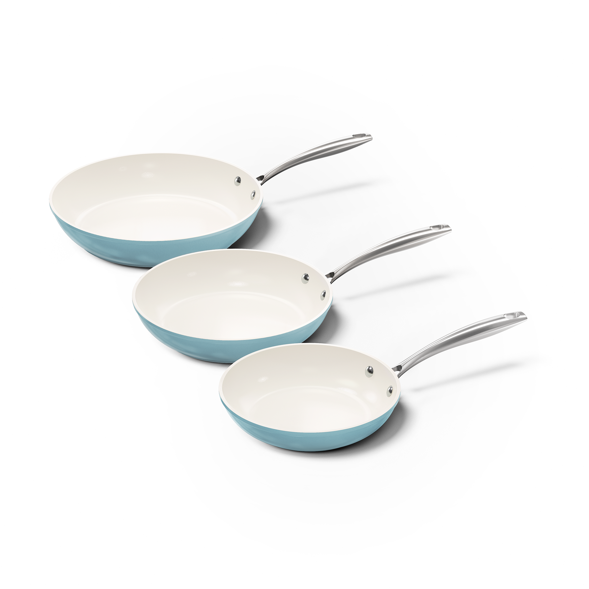 Set de trois poêles bleu clair avec intérieur en céramique blanche et poignées métalliques.