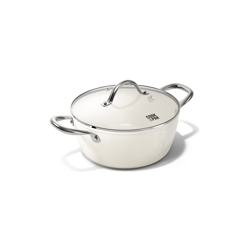 Ivorykleurige braadpan met deksel, stevige grepen en glanzende afwerking, 24 cm.