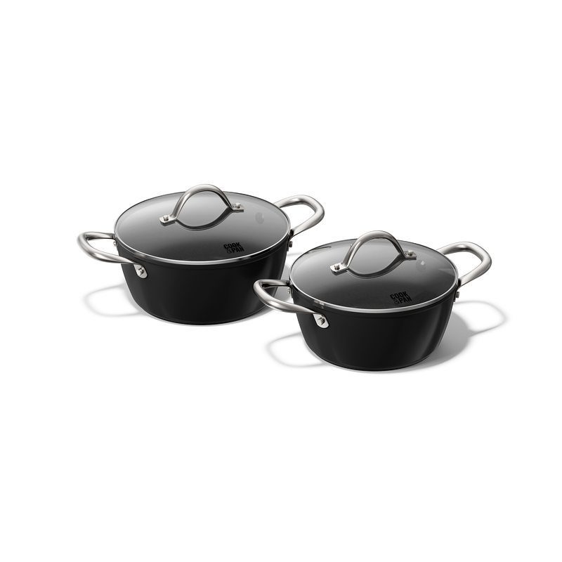 Sort 2-delt pandesæt med rustfri stålhåndtag og glaslåg.