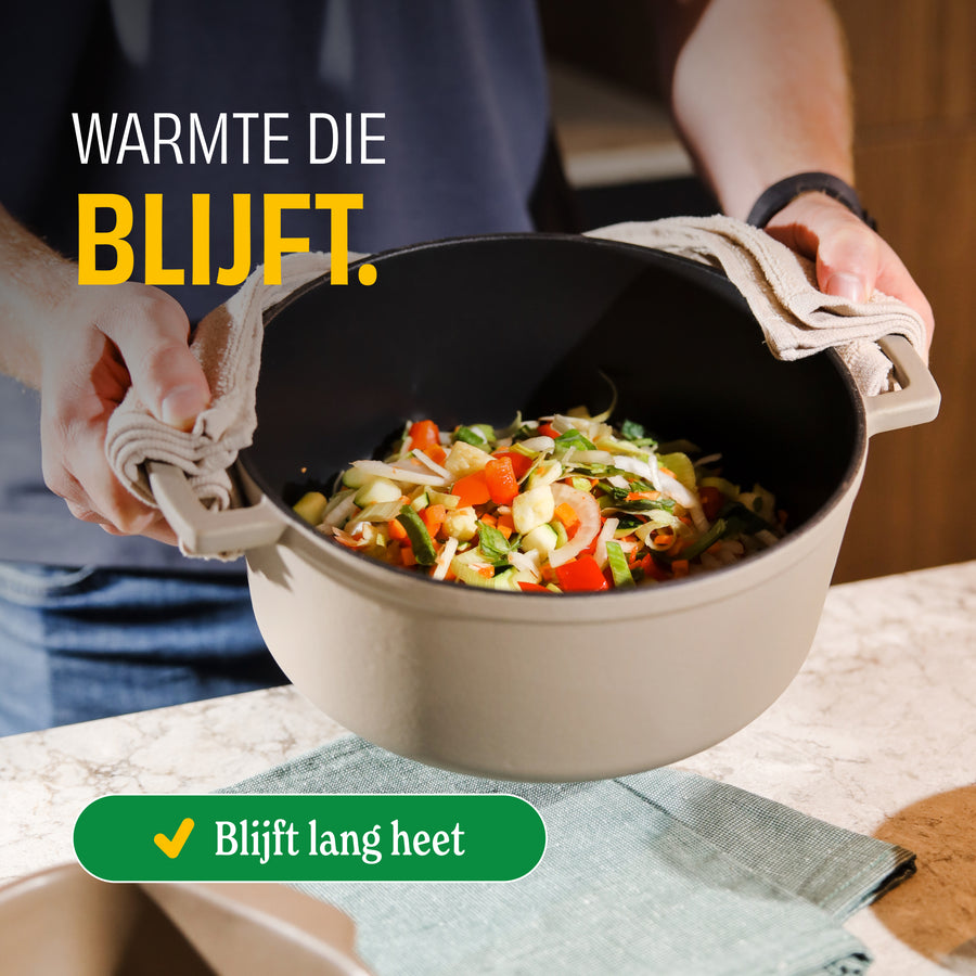 Taupe dutch oven with vegetables that stay hot for a long time during cooking.