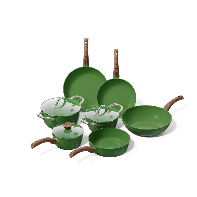 Green 7-piece pots and pans set with wooden handles and glass lids, including frying pans and saucepans.
